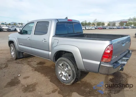 2014 Toyota Tacoma Base V6 z USA, uszkodzony, nr VIN 3TMLU4EN9EM143255